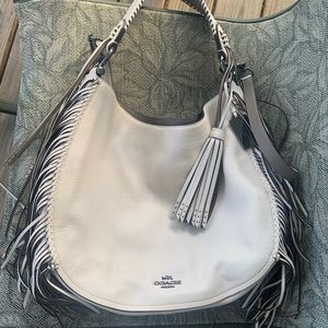 Coach Nomad hobo with whipstitch and tassels